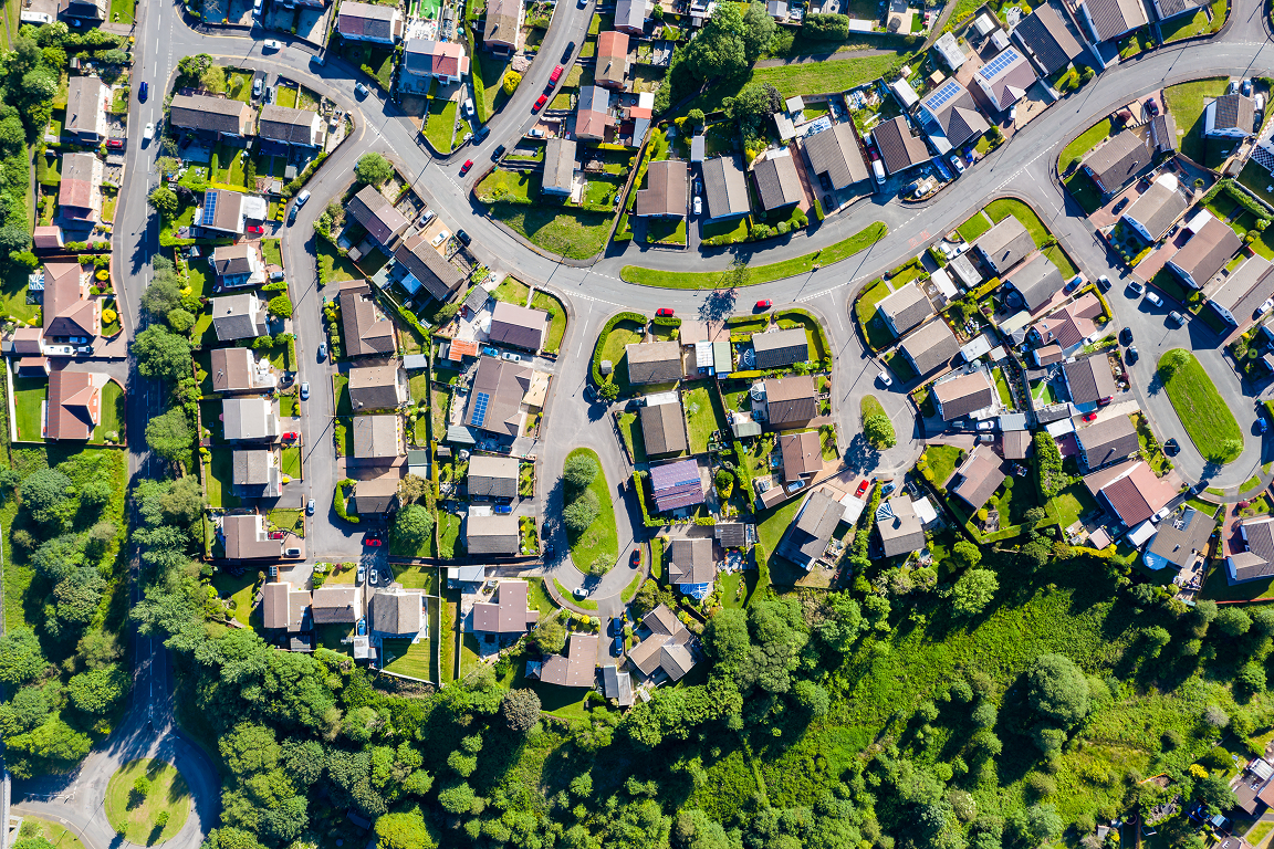 Aerial view of building footprints in a nondescript area.